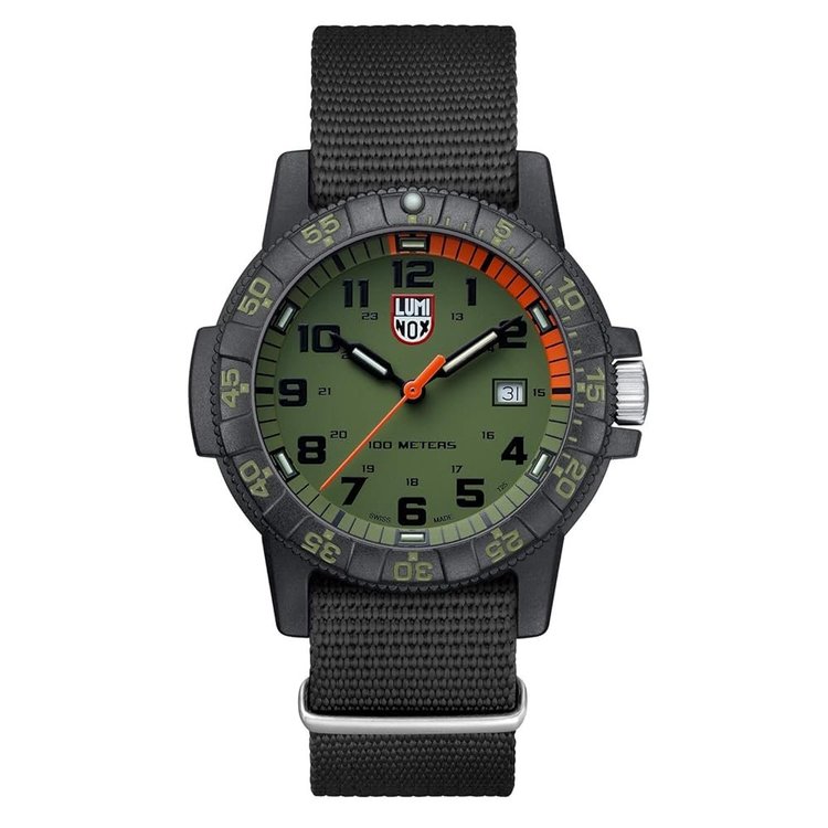 Luminox Navy SEAL 3000-series tactical dive watch with black case and green-accented dial on fabric strap
