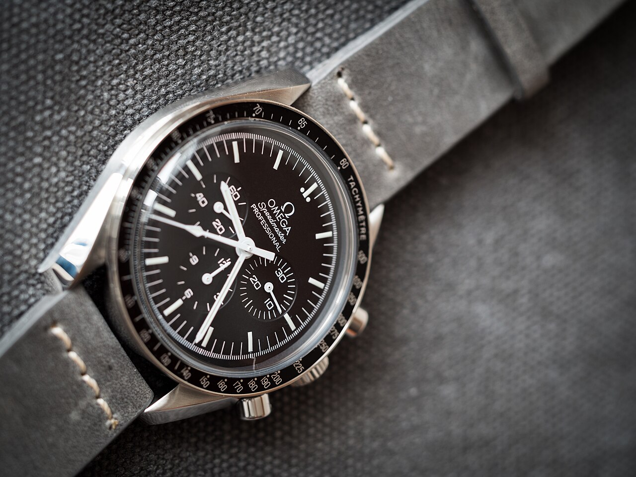 Omega Speedmaster Professional Moonwatch ref. 311.30.42.30.01.005 with black dial and hesalite crystal on steel bracelet