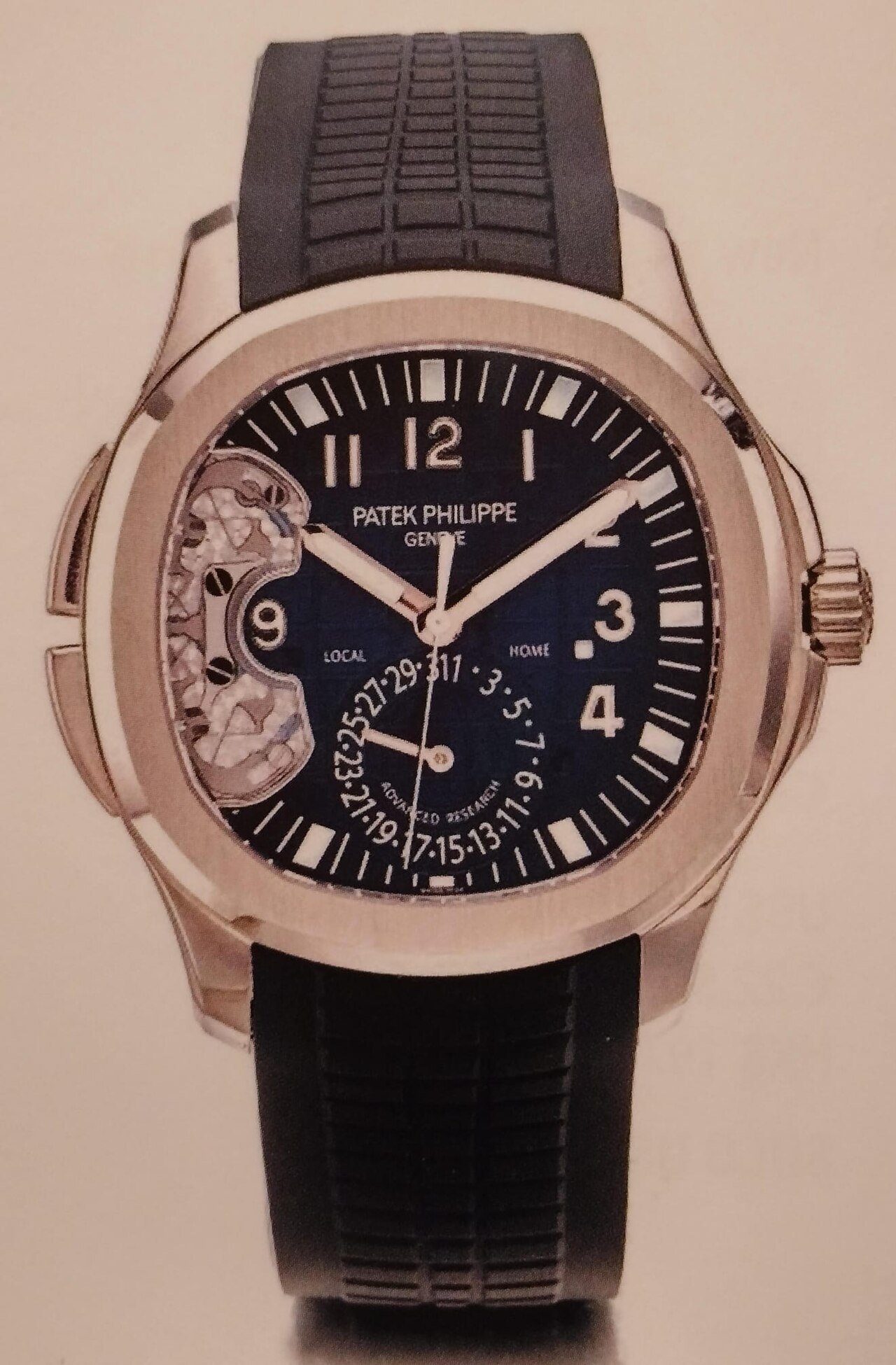 Patek Philippe Aquanaut with rounded octagonal case and embossed dial on composite strap (5650G Advanced Research shown)