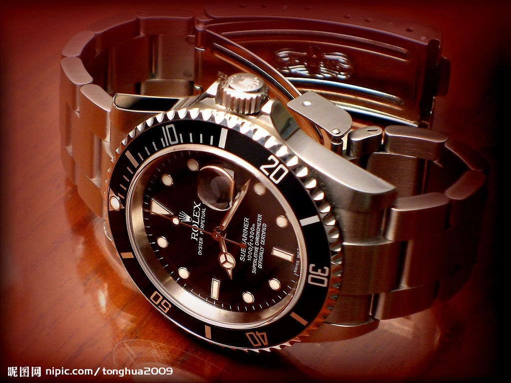 Rolex Submariner with black dial and black ceramic bezel on Oyster bracelet (116610LN shown — the 124060 shares the design without a date)