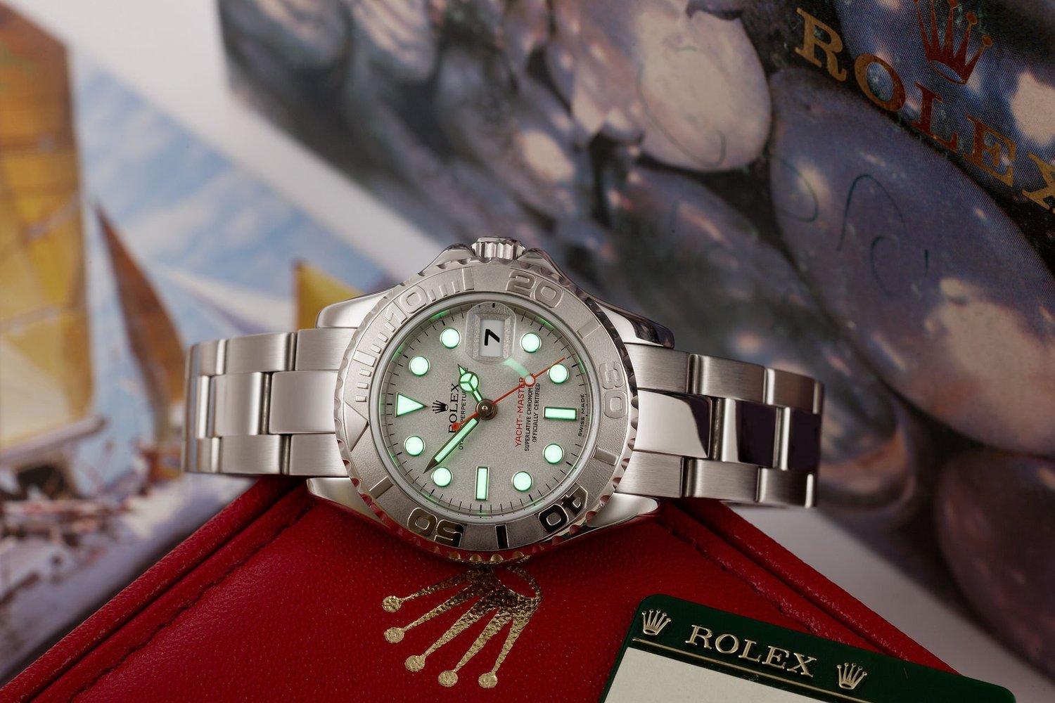 Rolex steel sport watch with rotating bezel